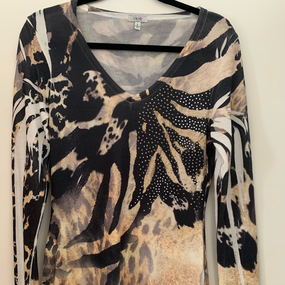 Caché tiger print sweater with rhinestone embellishment.
